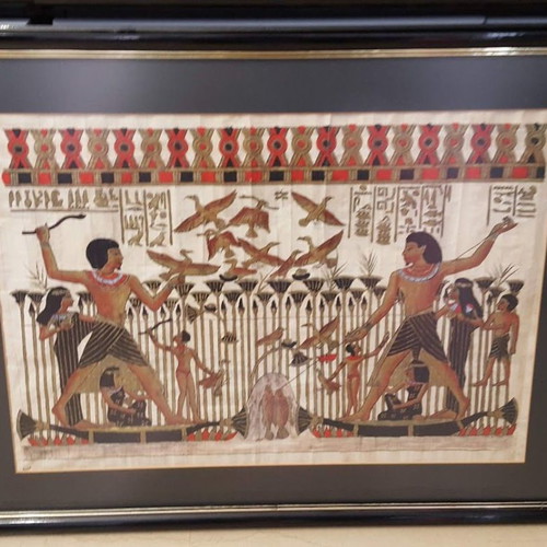 Egyptian papyrus used in wooden black frame