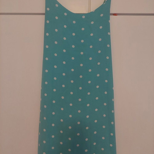 Light blue polka dot dress with crisscross back and side slits