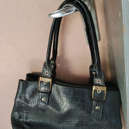 Vintage black women's shoulder bag with crocodile and snake texture, used