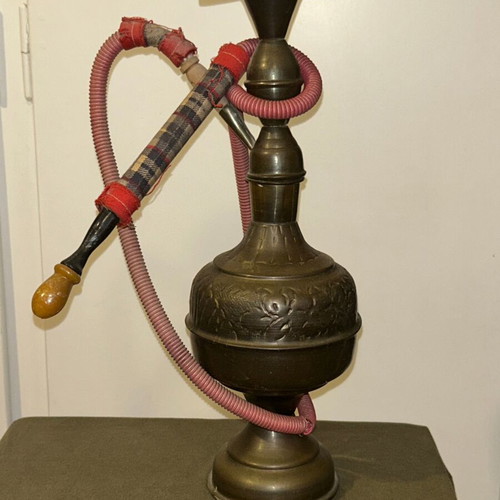Vintage brass decorative hookah with embossed designs, used