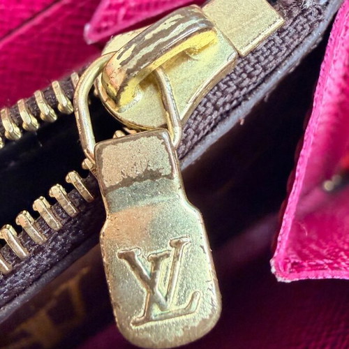 Louis Vuitton Clémence wallet used, monogram canvas with pink zipper