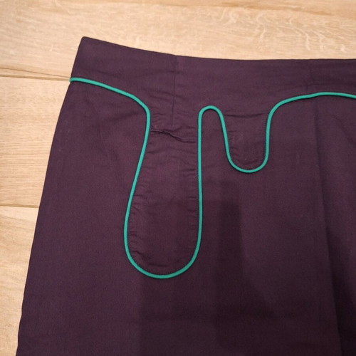 Skunkfunk skirt purple with green piping like new, size Large