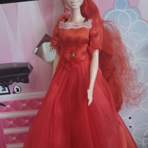 Barbie Colour Reveal doll with red dress