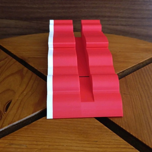 F1 phone stand new, plastic, red and white