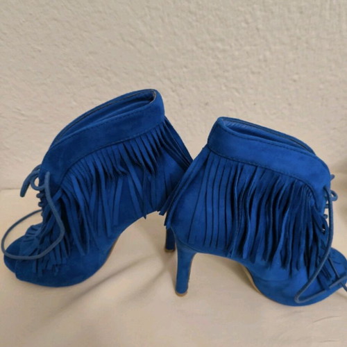 Blue high-heeled boots with fringes like new