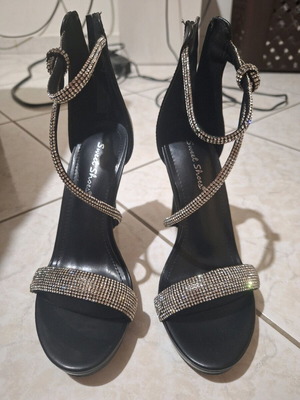High-heeled sandals like new, size 36