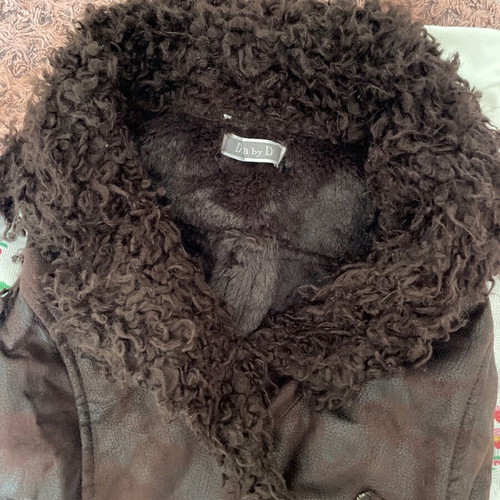 Vest made of eco leather and fur like new, vintage distressed style