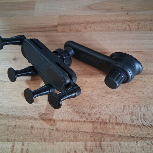 Car air vent phone holder like new with adjustable hook