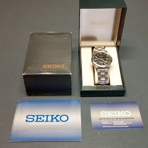 Seiko V742-8119 men's two-tone quartz wristwatch 38mm like new