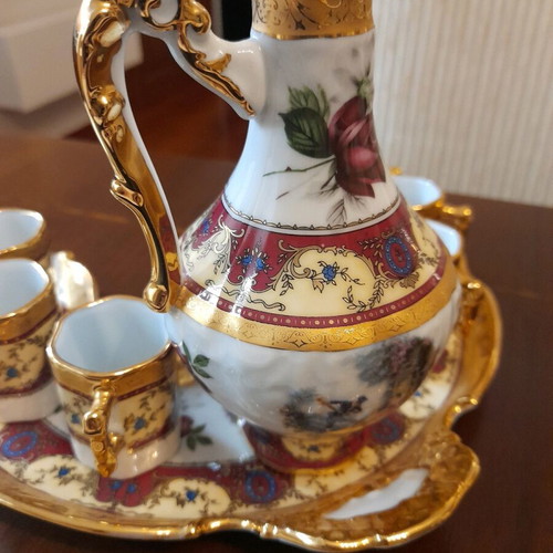 Limoge set with 22k gold leaves like new