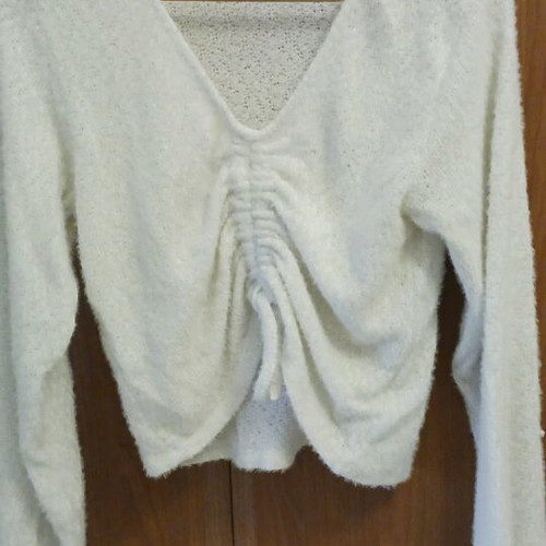 Beige blouse like new, slightly worn with unique design