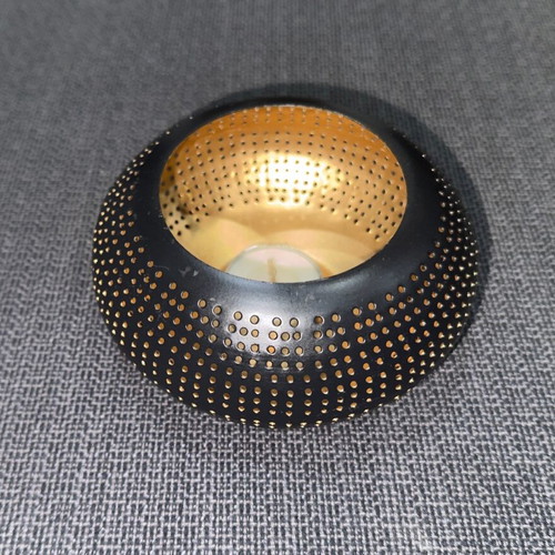 Metal tealight candle holder used black-gold with perforated design