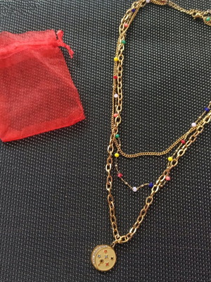 Triple necklace like new with moon and stars motif made of steel
