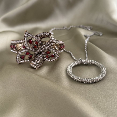 Hinged bangle and necklace charm set used