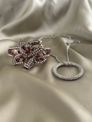Hinged bangle and necklace charm set used