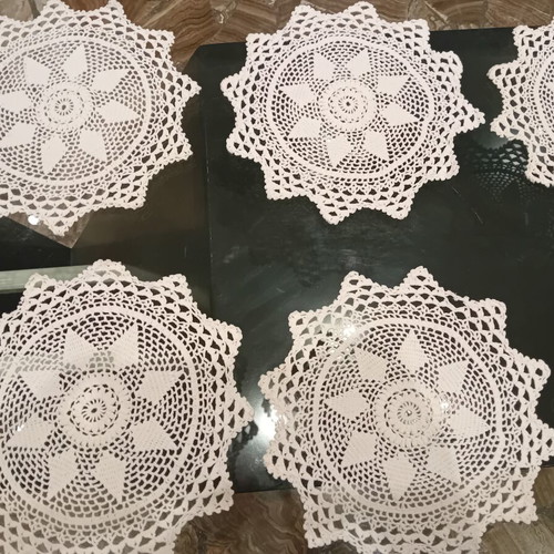 Handmade crochet doilies set of 9, star flower motif, 1965