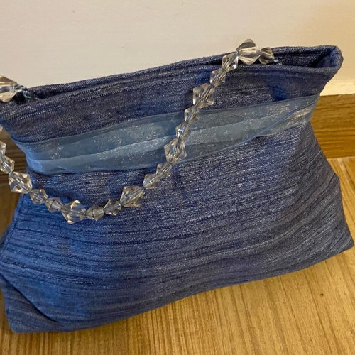 Small blue handbag new with ribbon and transparent beads