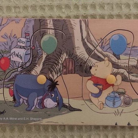 Wooden and paper puzzles used for children