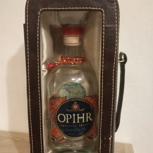 Collectible bottle in leather case like new