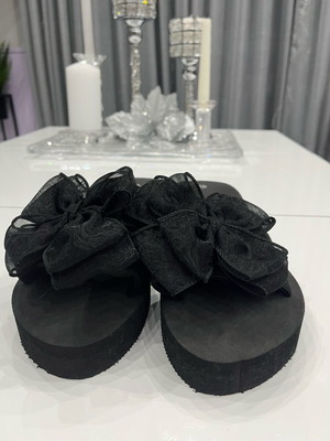 Women's flip-flops new with platform and bow black, size 40