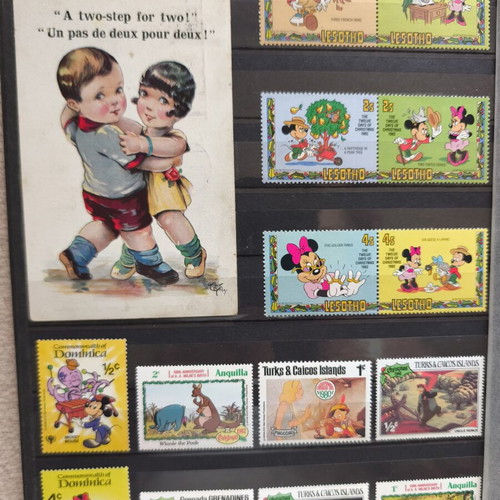 Disney collectible album with 220 stamps and 16 cards