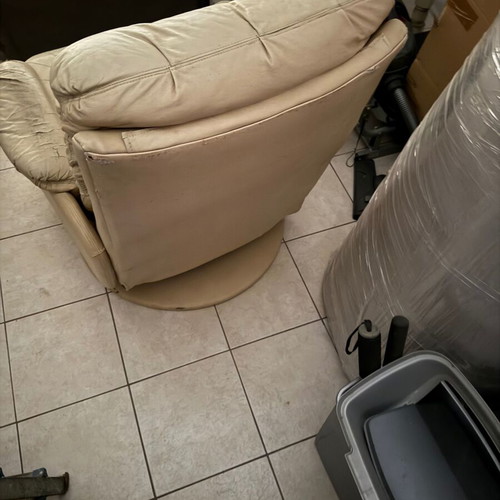 Leather armchair used with recline and 360° swivel