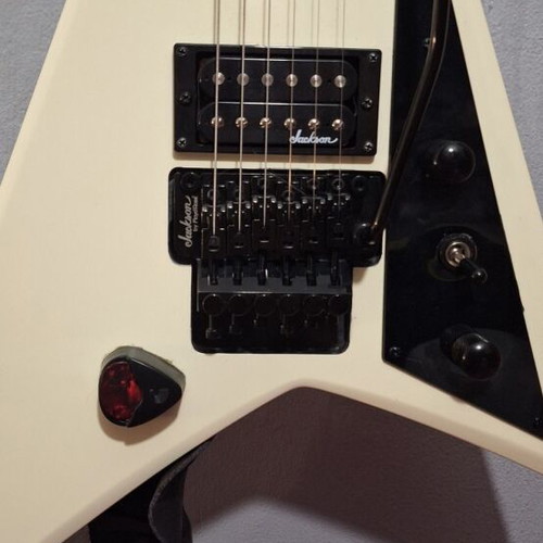Jackson JS32 electric guitar set with Marshall amplifier and Behringer pedal