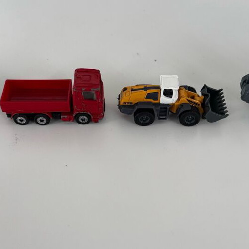 Siku 1:87 4 pieces like new, Scania truck, Liebherr 764, VW Golf