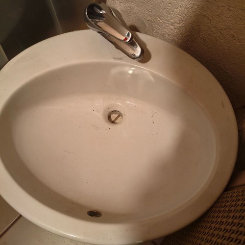 Kerasan sink used, oval white porcelain with faucet