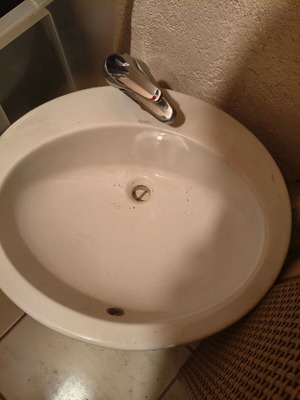 Kerasan sink used, oval white porcelain with faucet