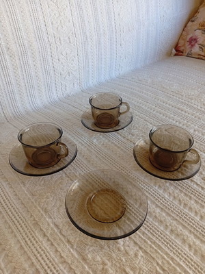 Glass cup set with saucers, large, one cup missing