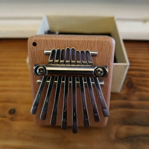 Mini kalimba new, closed in its box