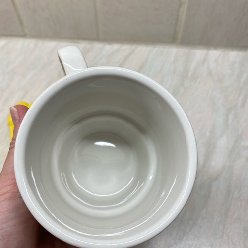 Ceramic mug new with plastic lid and spoon