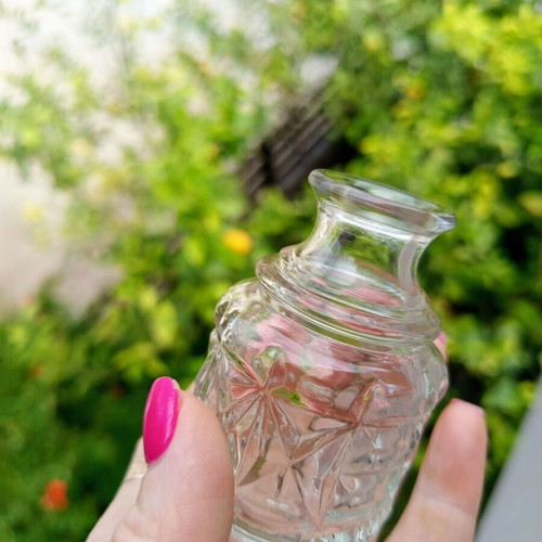 Vintage glass miniature bottle set of 2 with carved pattern and glass stopper
