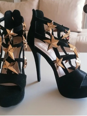 Black high-heeled sandals used with gold stars, size 38