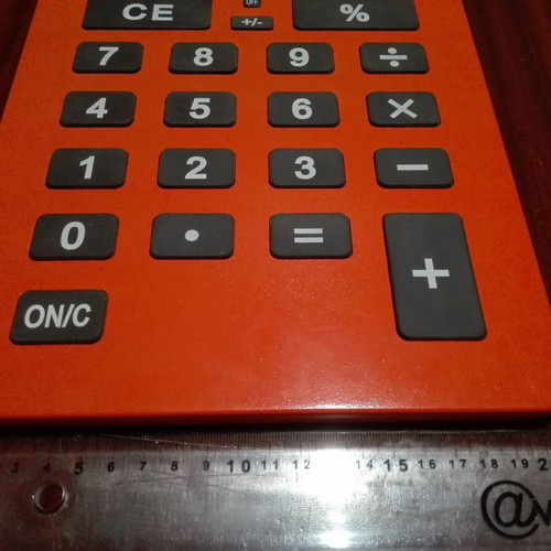 Giant calculator used, orange, A4 size