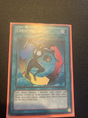 Creature Swap Yu-Gi-Oh! card like new, super rare