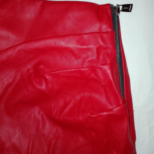 Mini leather skirt red cross design with side gathers like new