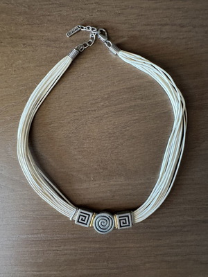 Women's handmade necklace with meander and spiral motifs like new, white