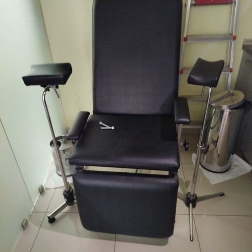 Medical phlebotomy chair used with replaced upholstery