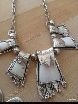 Modern necklace new made of hammered stainless steel with white resin