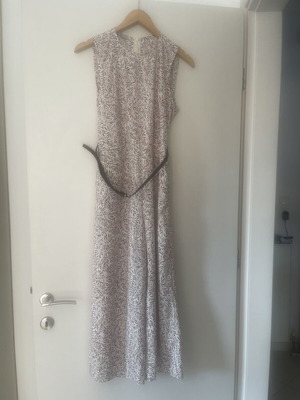 Regalinas sleeveless jumpsuit used, white with leaf print, sizes S/M