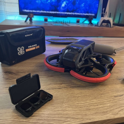 DJI Avata drone used with ND filters, 4 batteries, charger, and extras