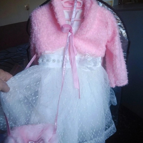 Complete baptism package new with dress, oil cloths, candle and accessories