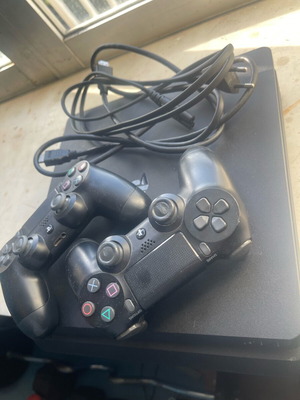 PlayStation 4 (PS4) like new with 2 controllers