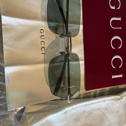 Gucci sunglasses with light blue lenses like new