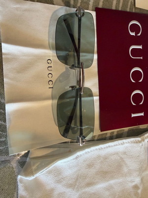 Gucci sunglasses with light blue lenses like new