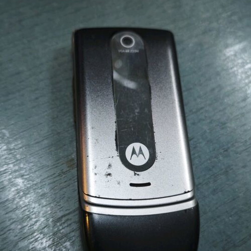 Motorola W 377 cell phone used, non-functional, silver