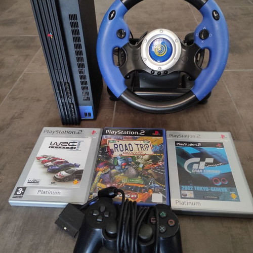 PlayStation 2 console used with controller, Hurricane wheel and 3 games