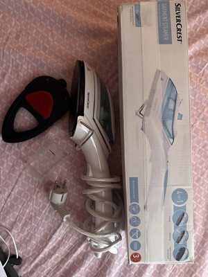 Travel iron like new with steam and accessories